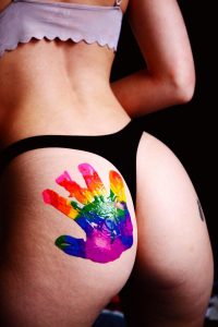 image with handprint(rainbow coloured) on the butt