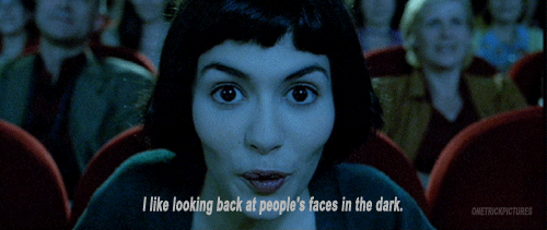 A GIF featuring an expressive woman's face saying, 'I like looking back at people's faces in the dark